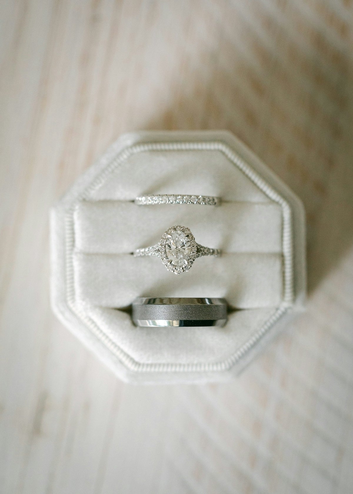Diamond ring in a white velvet ring box